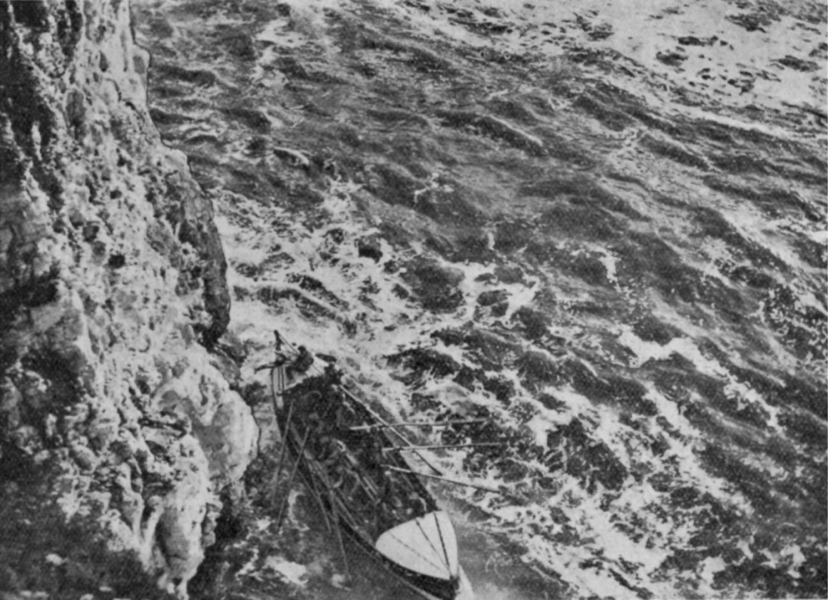 The Flamborough life boat rescuing four men trapped under the cliffs on 14th August 1934
