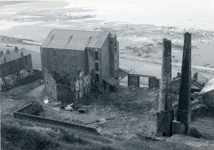 Maryport factory and chimneys on shore near gas works