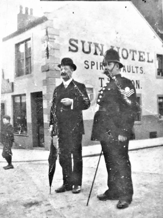 Wood Street Sun Hotel police sergeant and smart gent with bowler hat